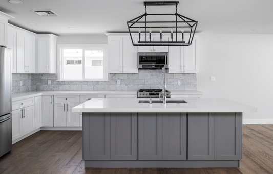 white shaker kitchen with gray island black light fixture over island kitchen remodel in Lake county Illinois Lotus Home Improvement