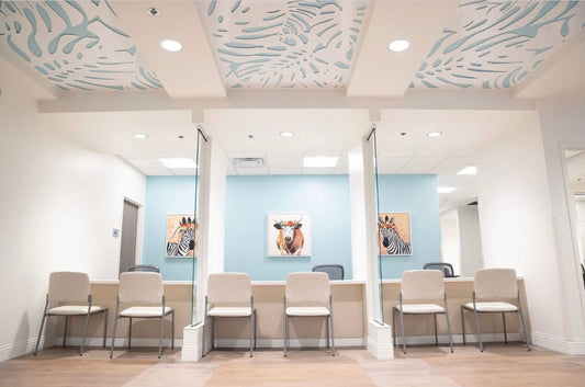 Modern medical office reception area with durable flooring and cabinetry by Lotus Home Improvement in Grayslake
