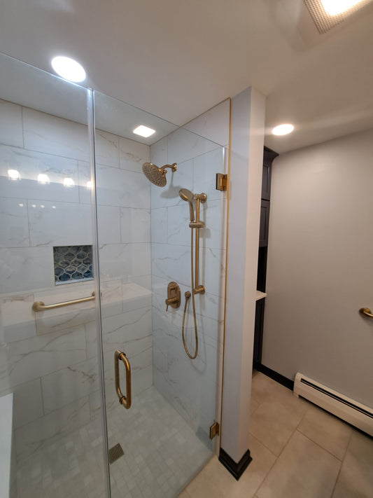 Walk-in shower designed for seniors featuring grab bars, handheld shower, and slip-resistant flooring by Lotus Home Improvement in Lake County IL